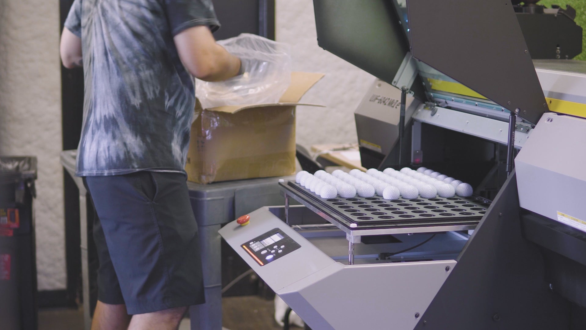 Load video: Watch as we print a set of golf balls with logos!